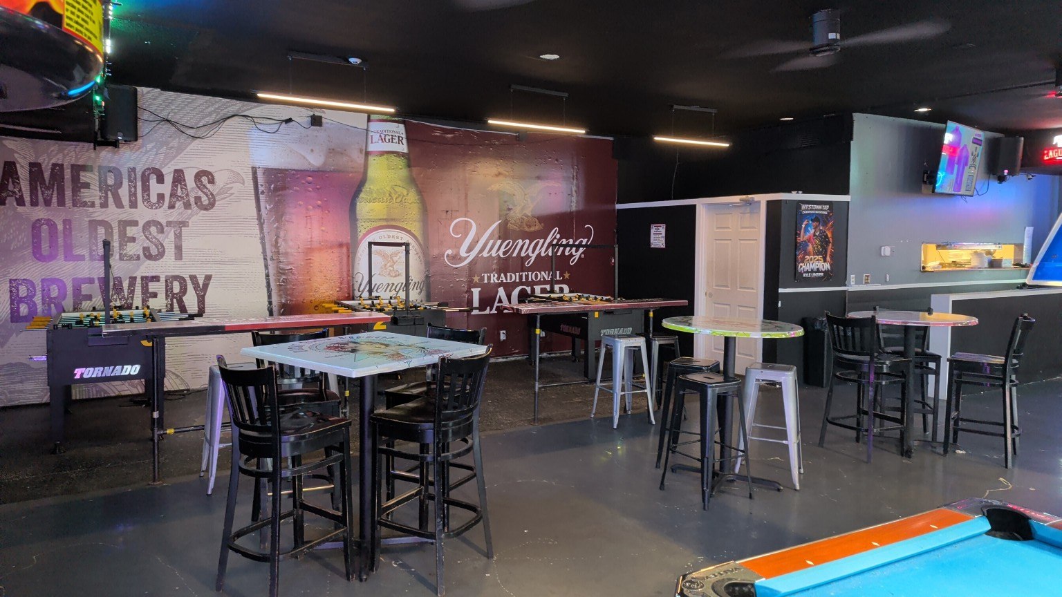 Foosball and table seating at Westown Tap
